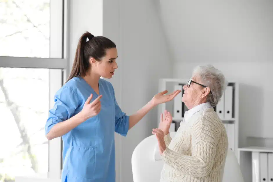 signs of nursing home abuse, image of nursing hurting elderly patient