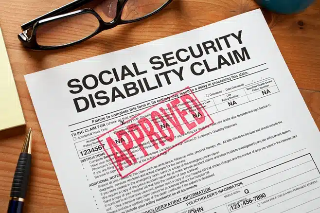 Social security disability lawyer, image of social security disability claim with approved stamp, Disparti Law Group