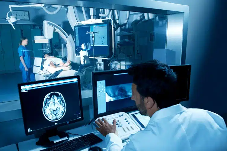 diagnostic error, image of doctor lookin at mri scan of patient brain