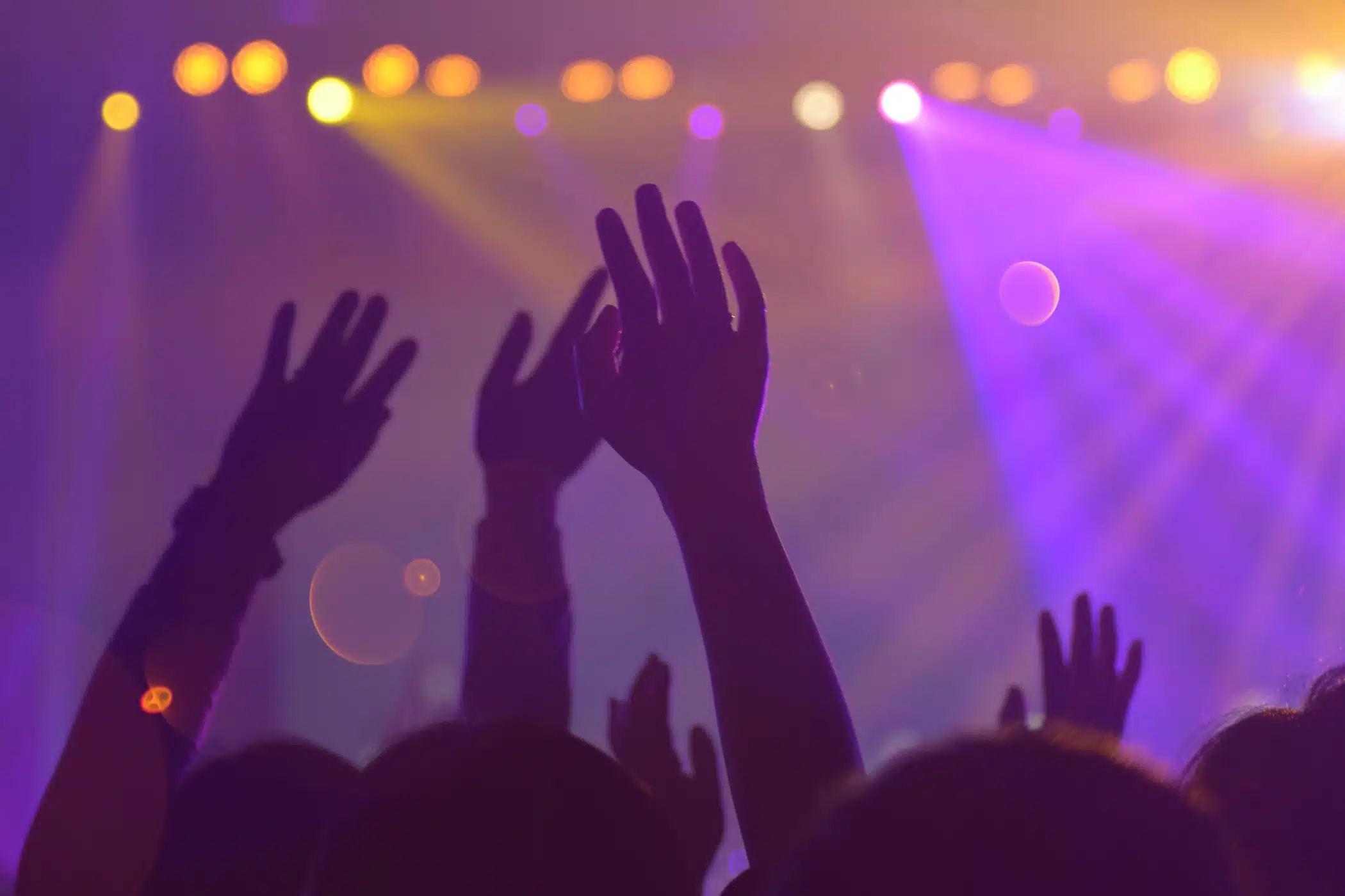 Apollo Theatre Roof Collapse, image of hands raised at concert