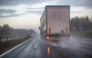 Truck merges in front of a car before the driver needs to call a Truck Accident Lawyer Springfield, IL