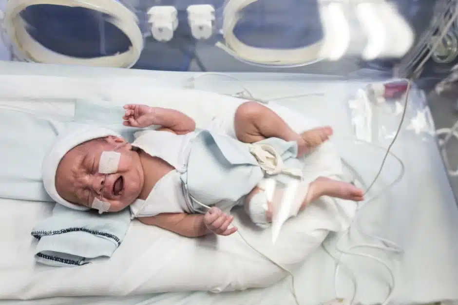 Chicago birth injury lawyer, image of newborn crying in incubator