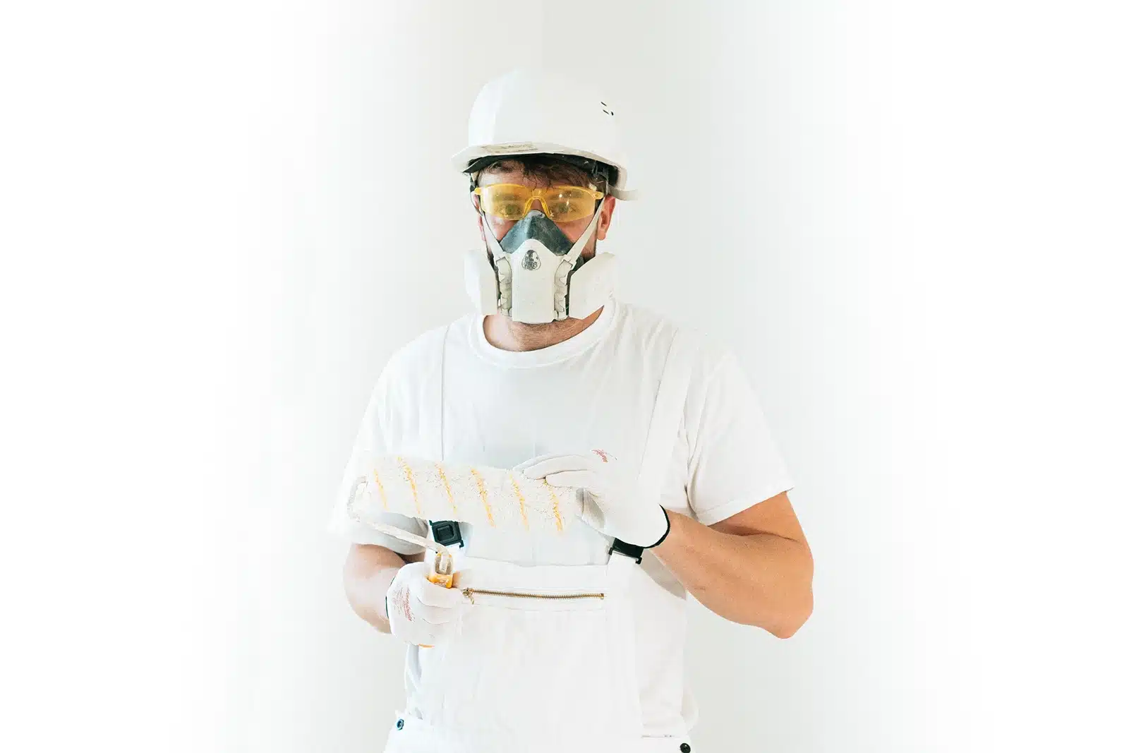 International Union of Painters and Allied Trades (IUPAT), image of painter in all white with mask on 