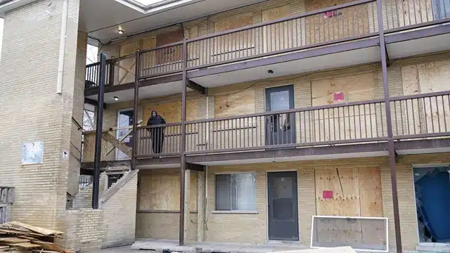 Unsafe living conditions, Image of harvery abandoned apartmnts boarded up, disparti law group