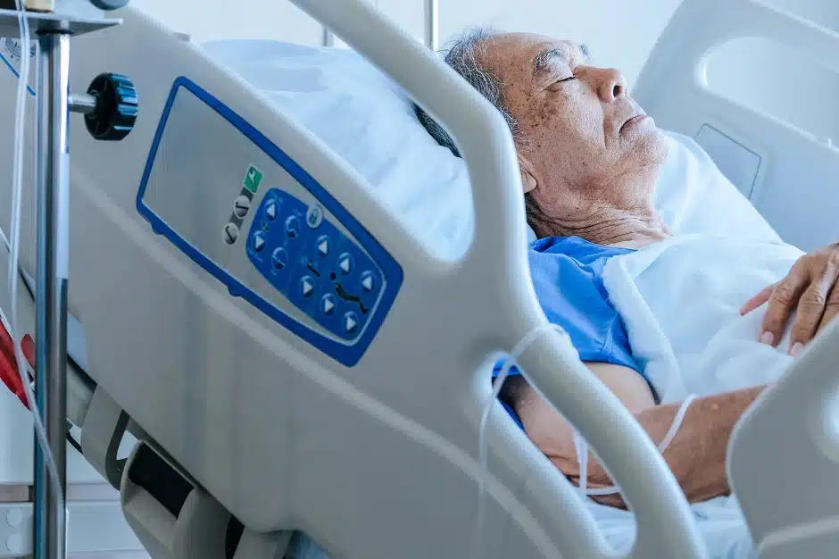 Sepsis in Elderly, image of elderly woman laying in hospital bed, Disparti Law Group