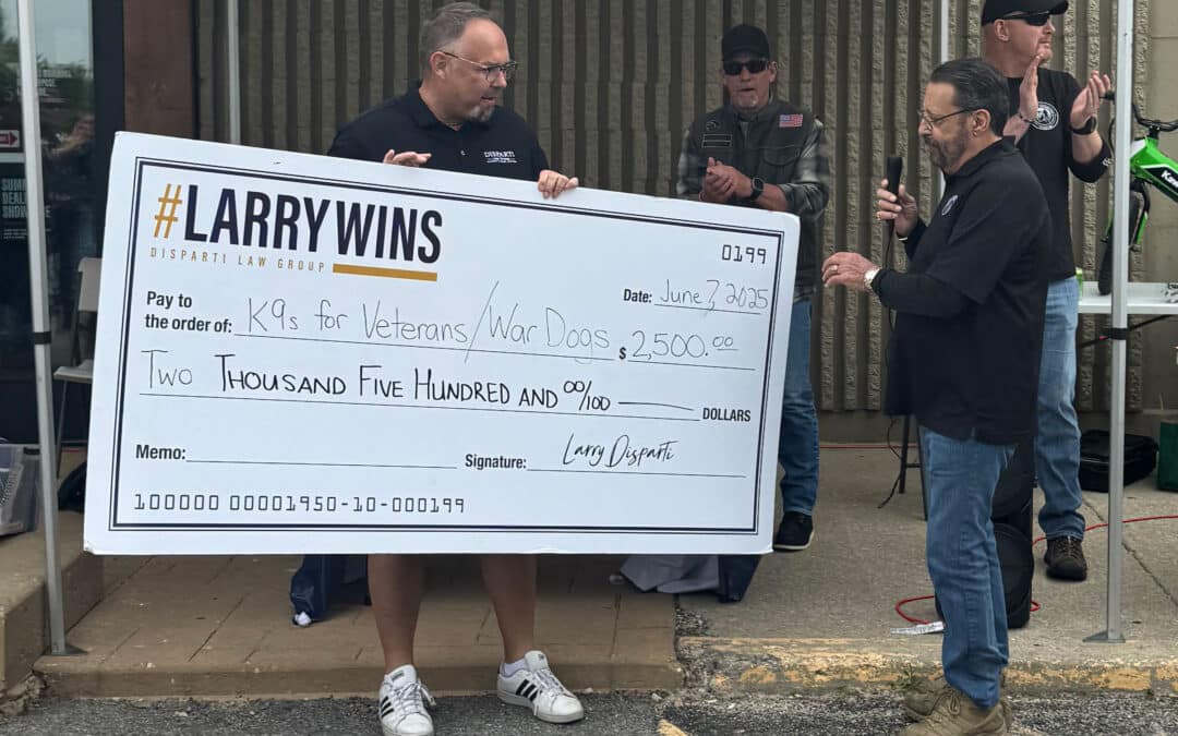 Disparti Law Presents Check to War Dogs/K9s for Veterans