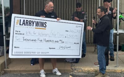Disparti Law Presents Check to War Dogs/K9s for Veterans